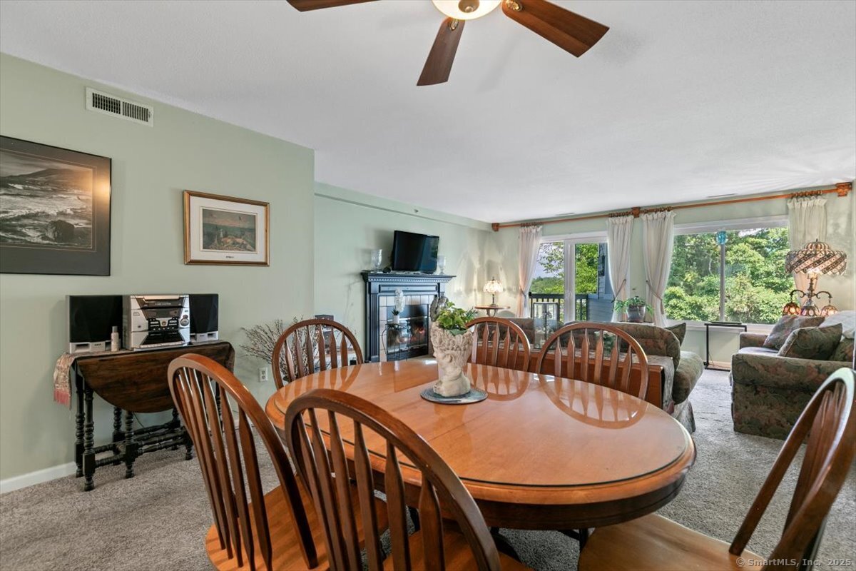 2 Mansfield Grove Road, Unit 262 East Haven, CT 06512 - Photo 19 of 47 There is plenty of room for a 6 top table and can even extend to an 8 top for family gatherings.