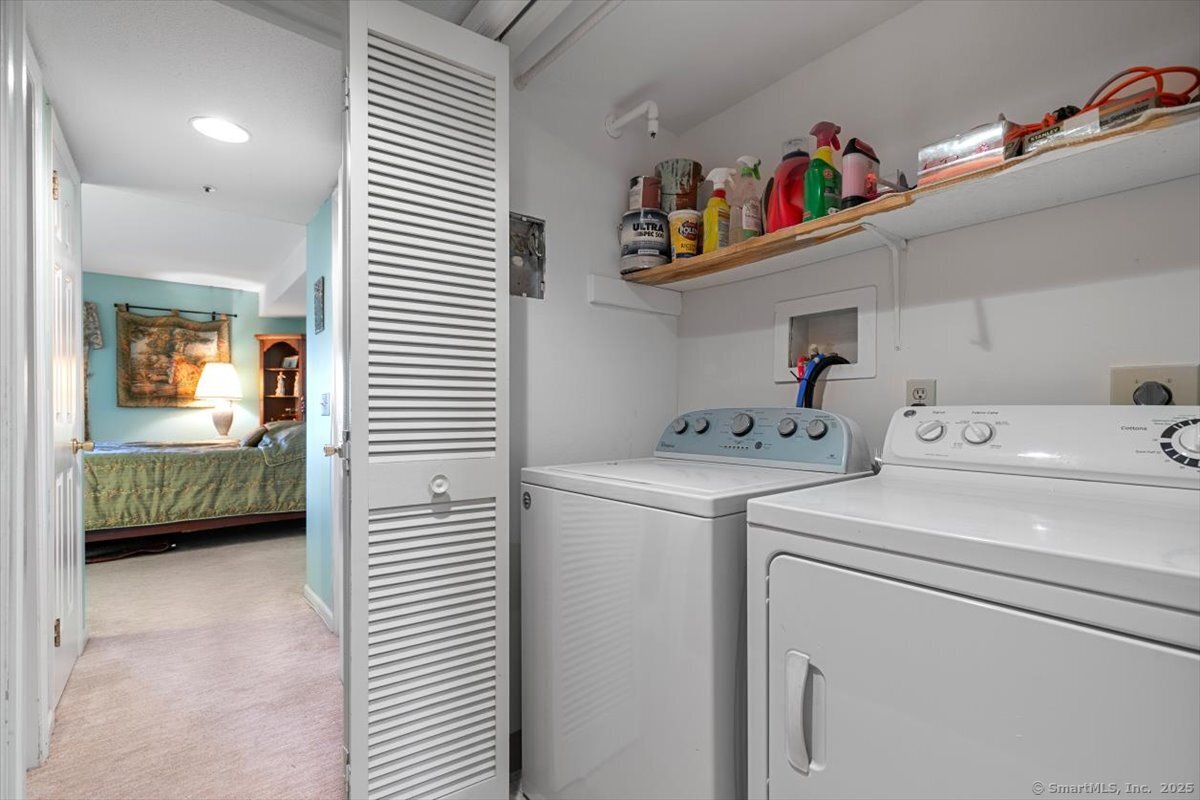 2 Mansfield Grove Road, Unit 262 East Haven, CT 06512 - Photo 23 of 40 The hall closet allows for full size washer/dryer and storage of soaps and fabric cleaners.