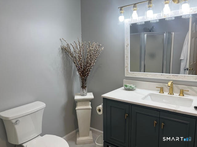 2 Mansfield Grove Road, Unit 262 East Haven, CT 06512 - Photo 4 of 47 The primary bath has been updated with a new vanity, mirror, lighting and fresh paint.