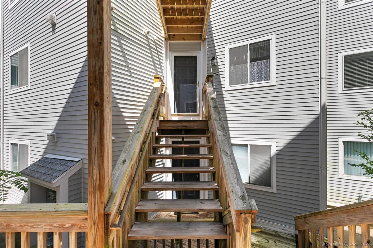 2 Mansfield Grove Road, Unit 262 East Haven, CT 06512 - Photo 41 of 47 Go from garage to elevator to these stairs to the front door.
