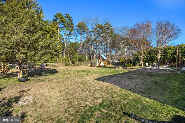 a view of a house with a park
