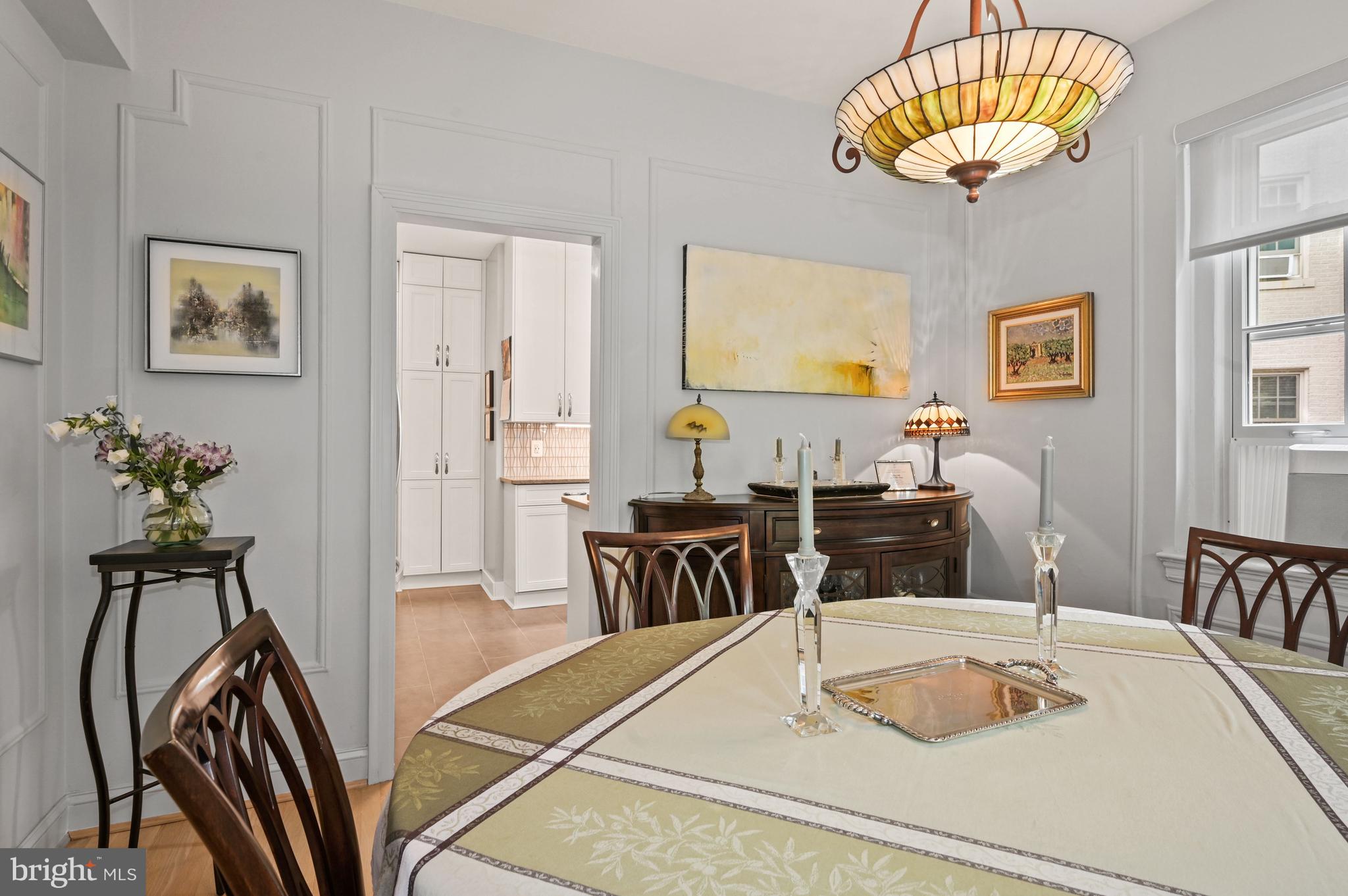 2737 Devonshire Place Northwest, Unit 123 Washington, DC 20008 - Photo 11 of 46 Dining room opens to gourmet kitchen