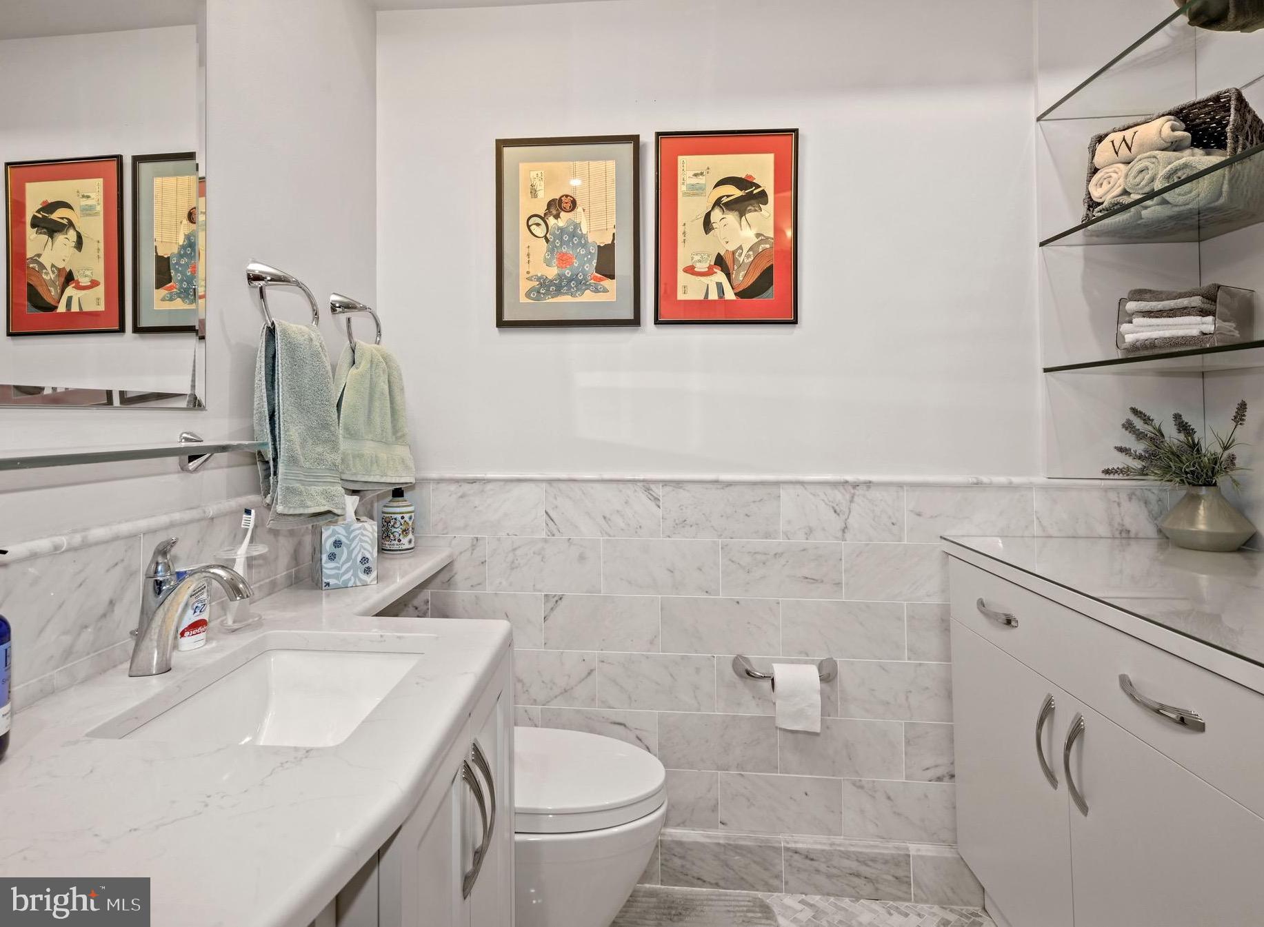 2737 Devonshire Place Northwest, Unit 123 Washington, DC 20008 - Photo 20 of 46 Stunning master bathroom w/ built-in, Cararra tile
