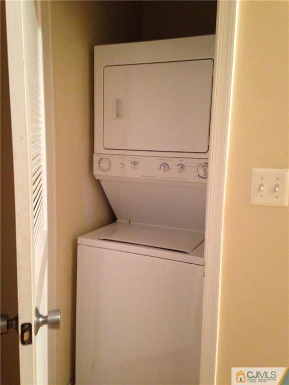 1130 Edpas Road, Unit 1130 New Brunswick, NJ 08901 - Photo 12 of 12 a close up of a washer and dryer