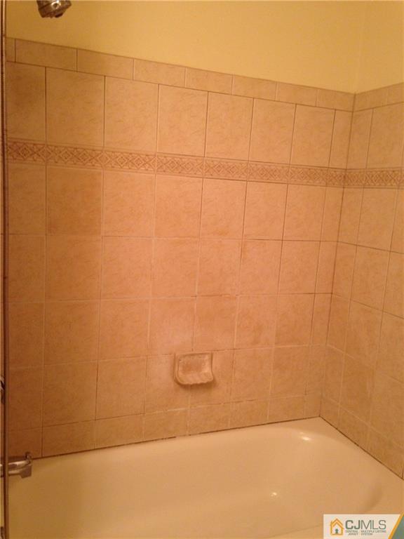 1130 Edpas Road, Unit 1130 New Brunswick, NJ 08901 - Photo 7 of 12 a bathroom with a shower