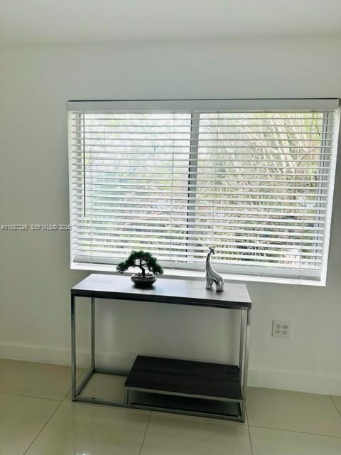 1030 Northeast 80th Street, Unit 4 Miami, FL 33138 - Photo 18 of 28 a view of room with a window
