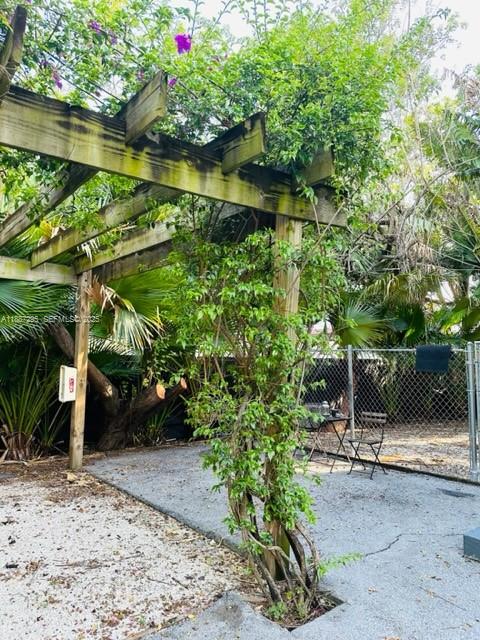1030 Northeast 80th Street, Unit 4 Miami, FL 33138 - Photo 27 of 28 a view of a backyard