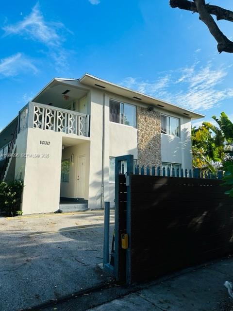 1030 Northeast 80th Street, Unit 4 Miami, FL 33138 - Photo 28 of 28 a front view of a house