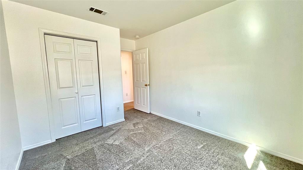 4503 Fortuna Street Fort Worth, TX 76119 - Photo 17 of 26 an empty room with closet