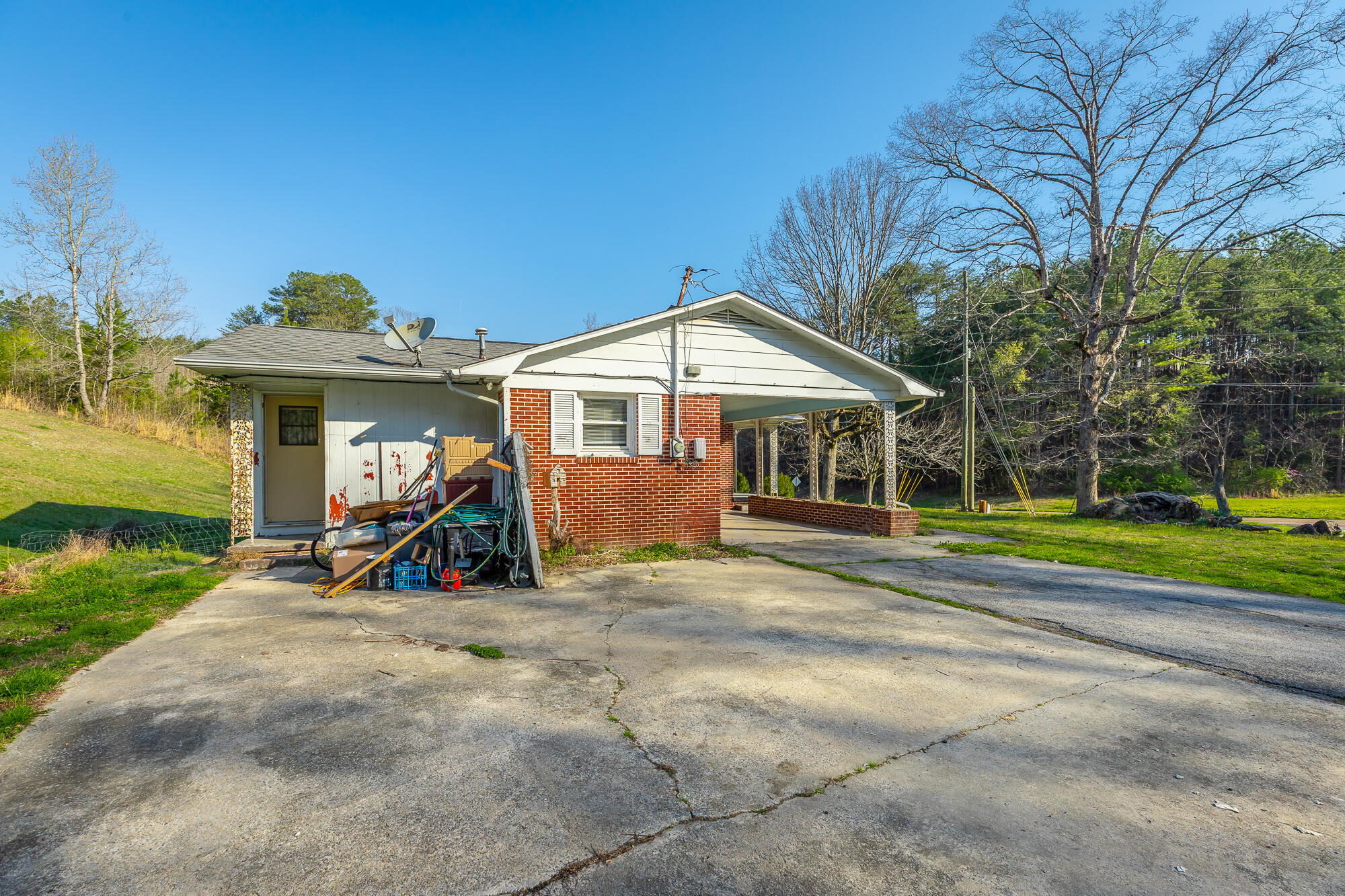 756 Blythes Ferry Road Dayton, TN 37321 - Photo 19 of 26 Side of home and parking