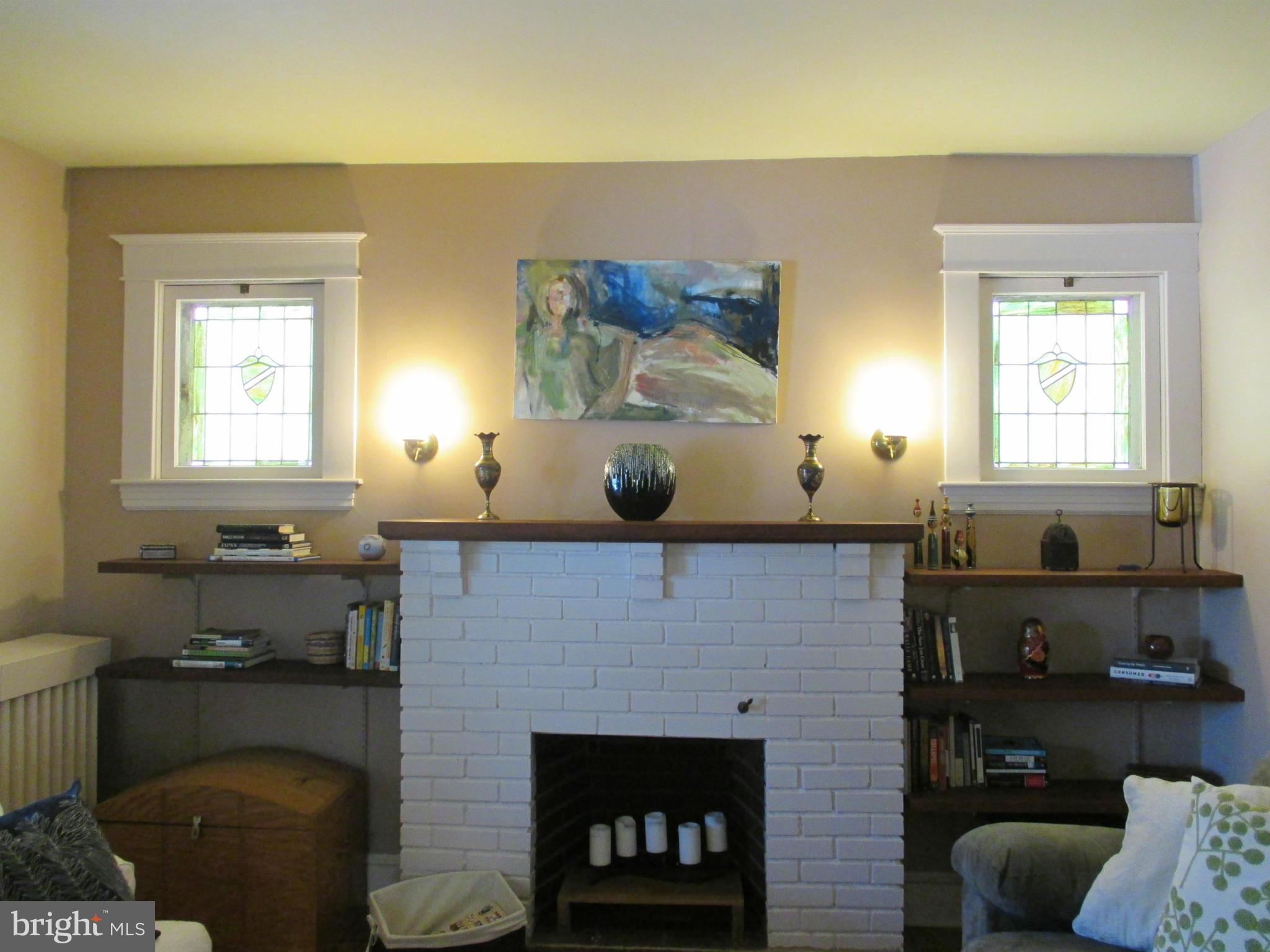 228 Mallow Hill Road Baltimore, MD 21229 - Photo 5 of 25 Fireplace/Mantel with Stained Glass Windows