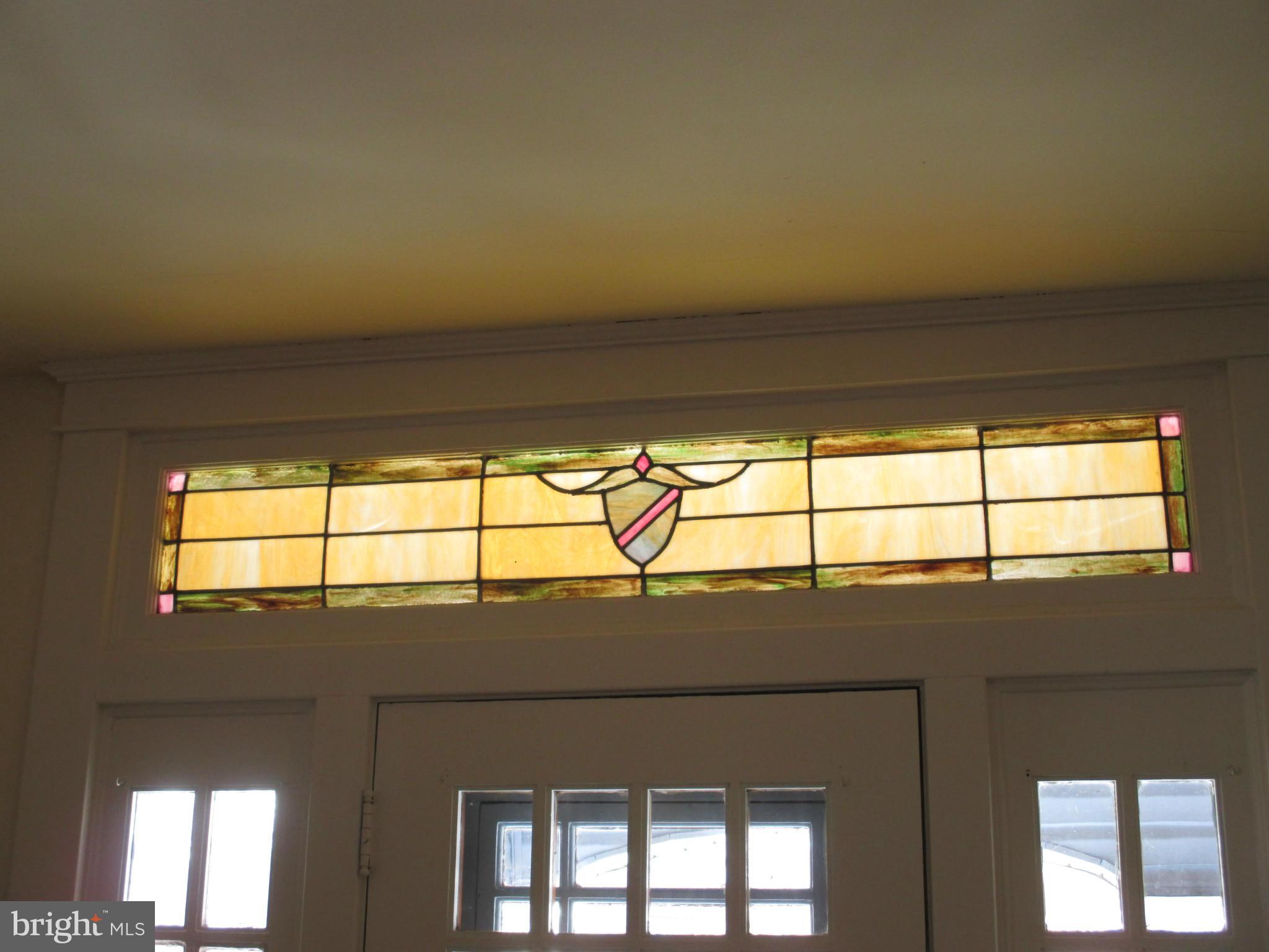 228 Mallow Hill Road Baltimore, MD 21229 - Photo 9 of 25 Foyer with Stained Glass Windows