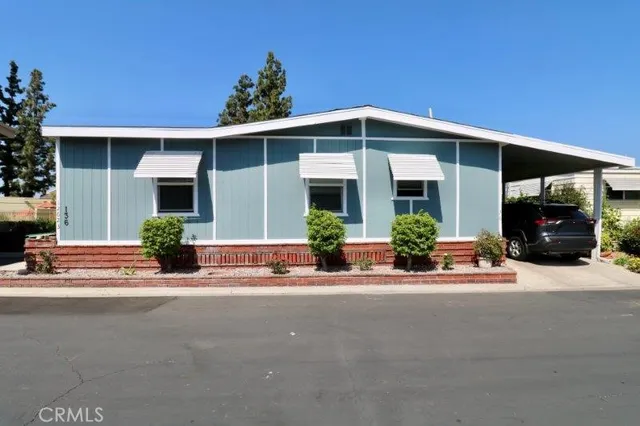 front view of a house with a patio