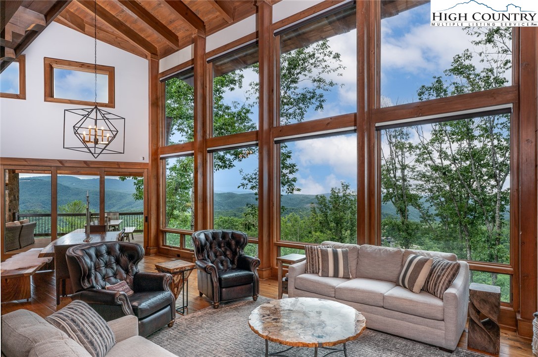 550 Pepperroot Road Boone, NC 28607 - Photo 17 of 50 a living room with furniture and a large window