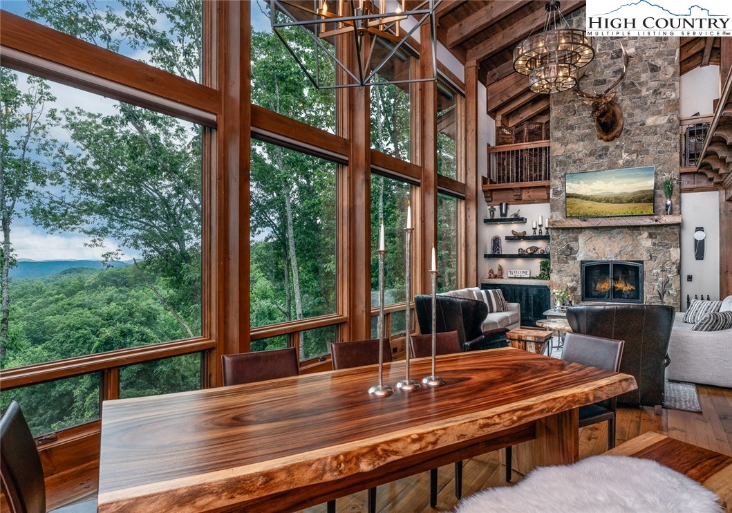 550 Pepperroot Road Boone, NC 28607 - Photo 20 of 50 a view of a patio with a table chairs and a table