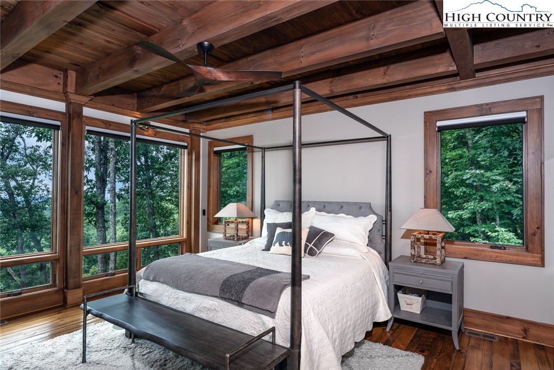 550 Pepperroot Road Boone, NC 28607 - Photo 23 of 50 a bed sitting in a balcony next to a window