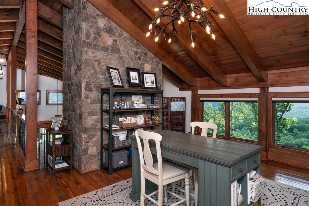 550 Pepperroot Road Boone, NC 28607 - Photo 31 of 50 a view of a dining room with furniture window and wooden floor