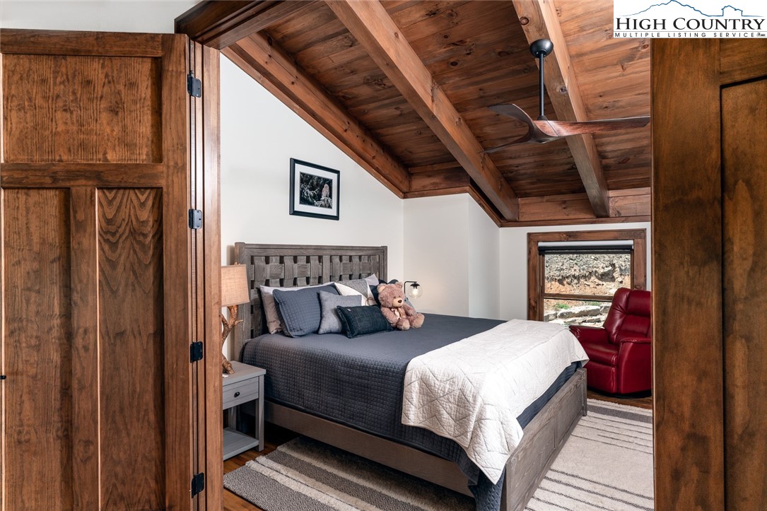 550 Pepperroot Road Boone, NC 28607 - Photo 32 of 50 a bed room with a bed and a window