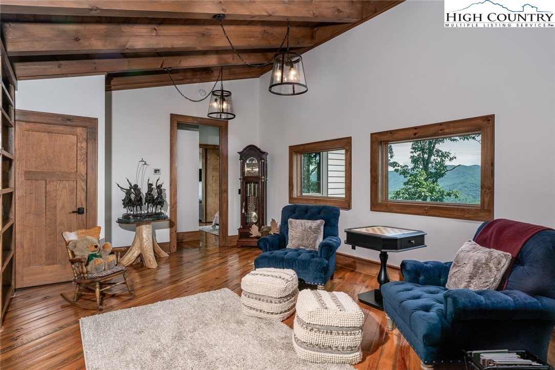 550 Pepperroot Road Boone, NC 28607 - Photo 36 of 50 a living room with furniture and a large window