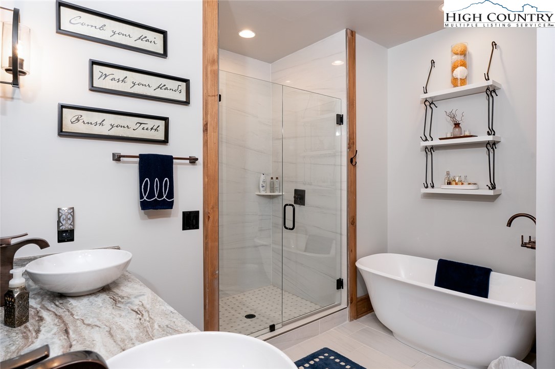 550 Pepperroot Road Boone, NC 28607 - Photo 49 of 50 a bathroom with a toilet sink and shower