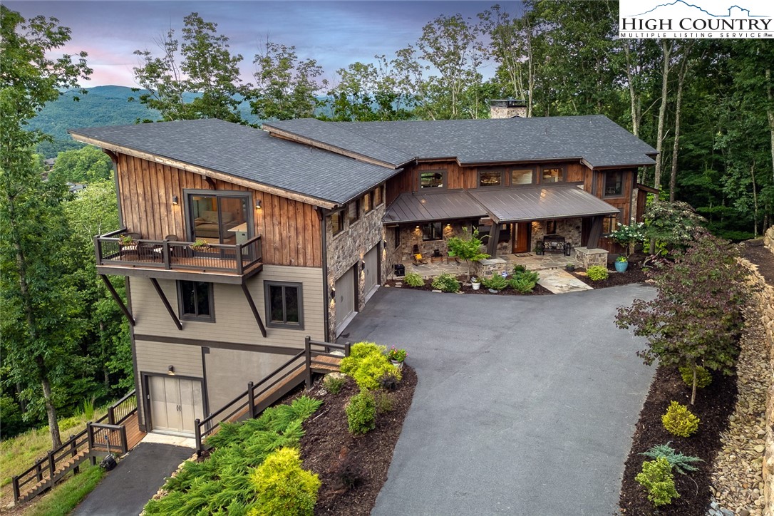 550 Pepperroot Road Boone, NC 28607 - Photo 7 of 50 an aerial view of a house with swimming pool and garden