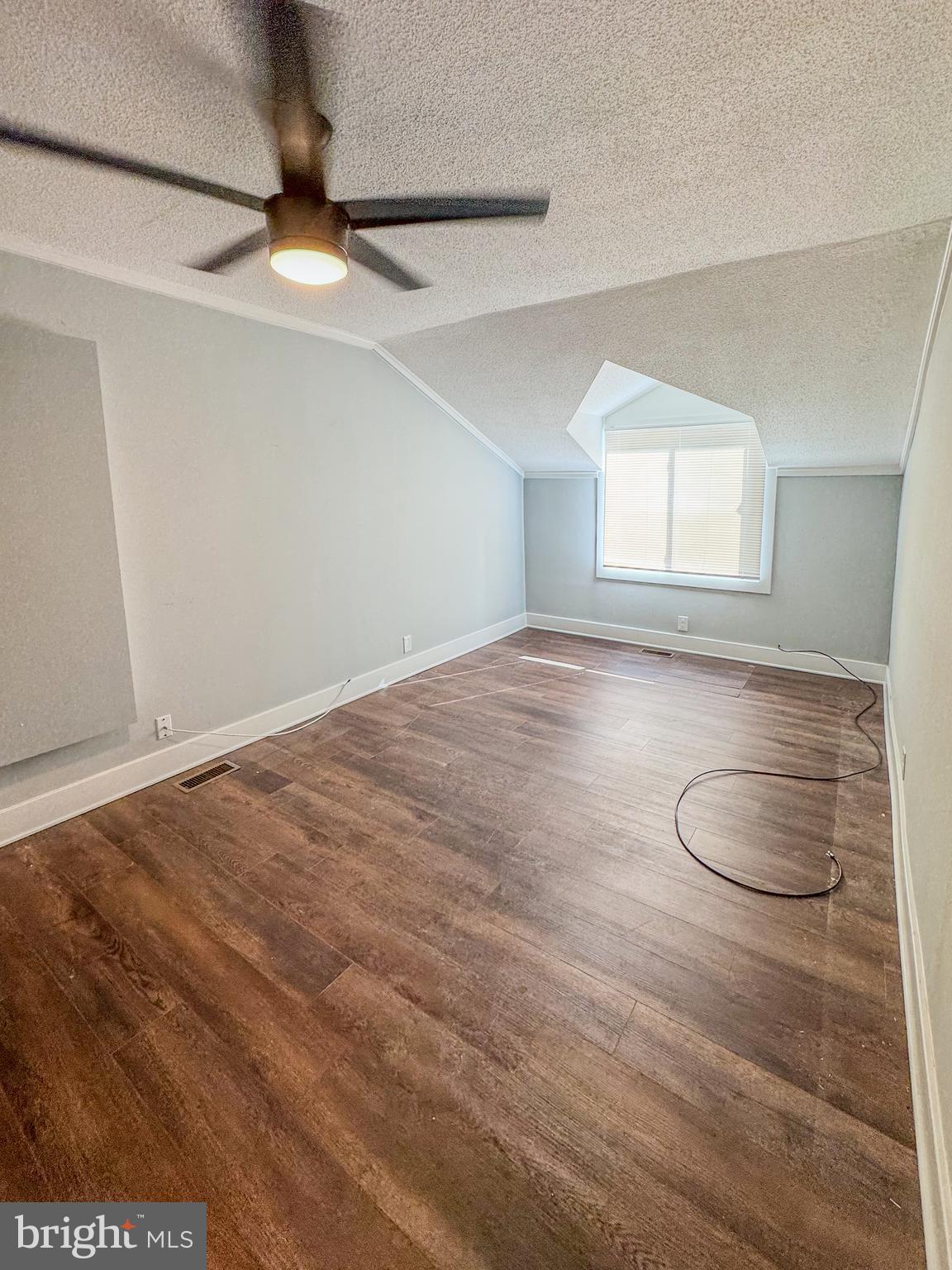 357 Jackson Road Mantua, NJ 08051 - Photo 12 of 15 a view of a room with wooden floor and fan