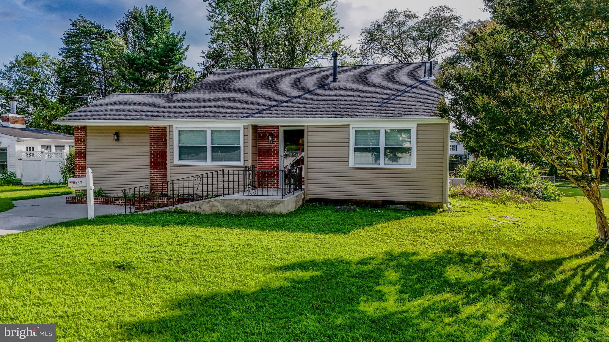 357 Jackson Road Mantua, NJ 08051 - Photo 3 of 15 a view of a house with a backyard