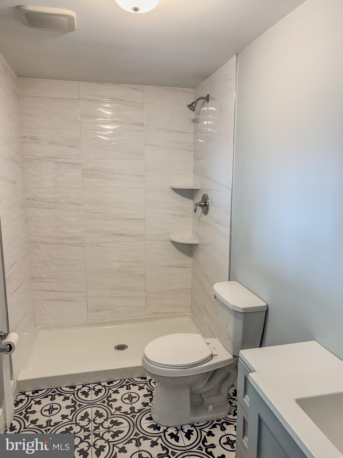 357 Jackson Road Mantua, NJ 08051 - Photo 8 of 15 a bathroom with a toilet and a shower