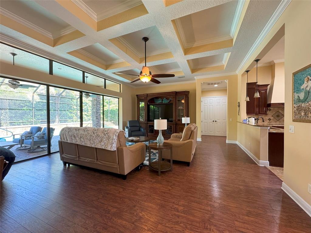 1024 West Beagle Run Loop Hernando, FL 34442 - Photo 9 of 44 a living room with furniture and large windows
