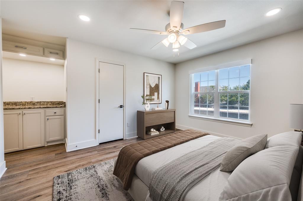 1257 Roaring Springs Road Fort Worth, TX 76114 - Photo 4 of 11 a bedroom with a large bed and a window