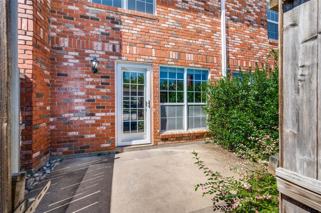 1257 Roaring Springs Road Fort Worth, TX 76114 - Photo 10 of 11 front view of a brick house with a large window
