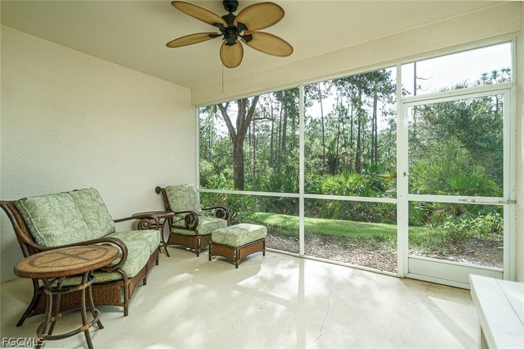 9667 Hemingway Lane, Unit 3107 Fort Myers, FL 33913 - Photo 13 of 23 a living room with furniture and a window