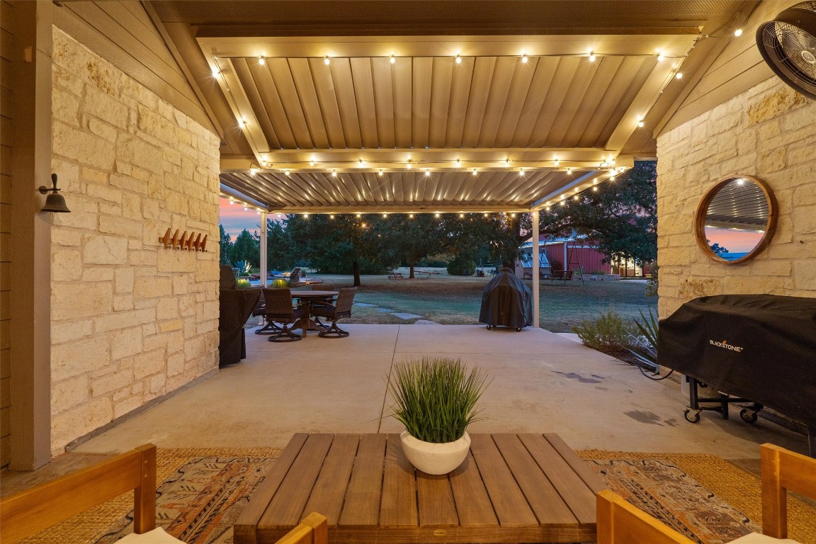 323 Patricia Road Georgetown, TX 78628 - Photo 18 of 40 a view of a patio with a table and chairs