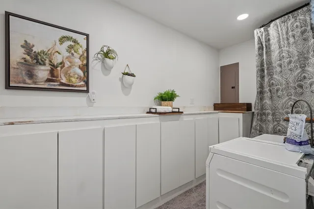 a kitchen with a sink and a window