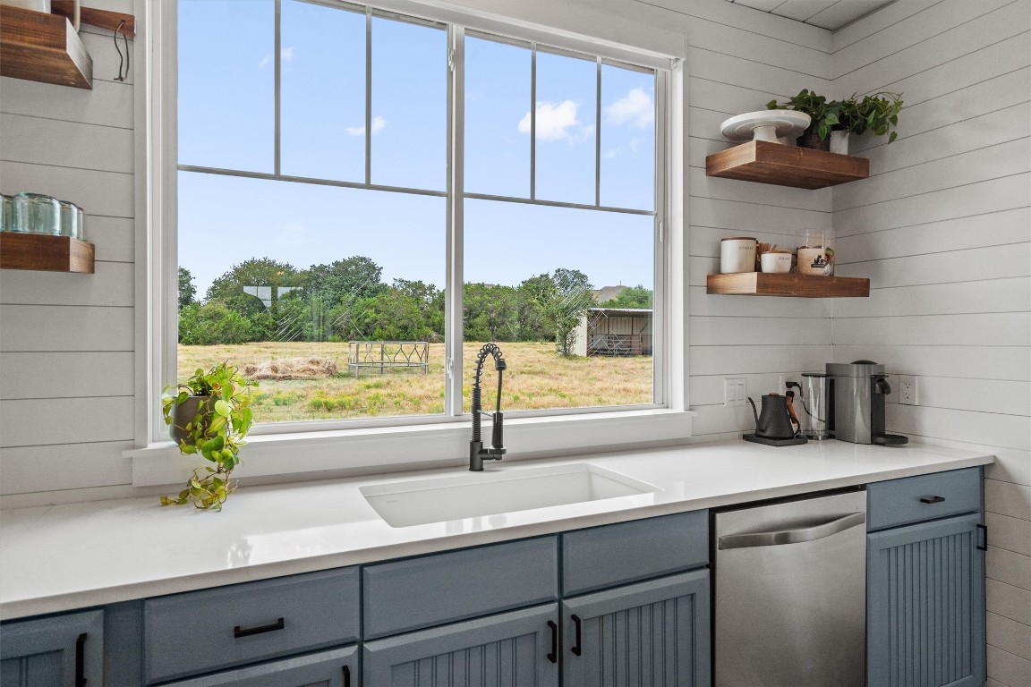 323 Patricia Road Georgetown, TX 78628 - Photo 27 of 40 a kitchen with a sink and a window