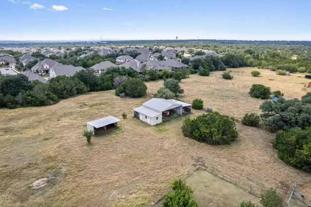 a view of a lake in middle of the city