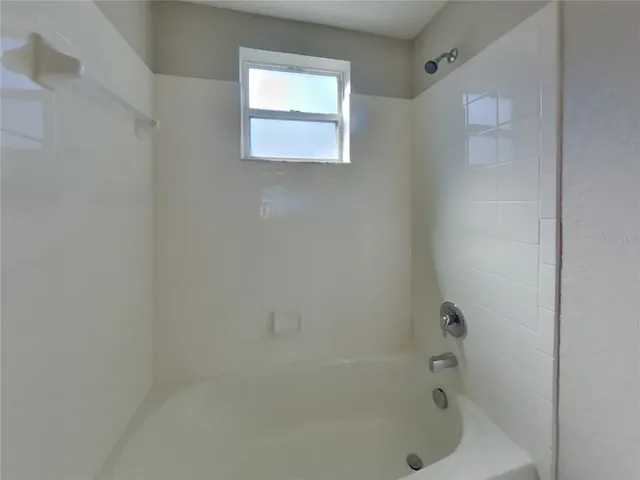 a bathroom with a bathtub