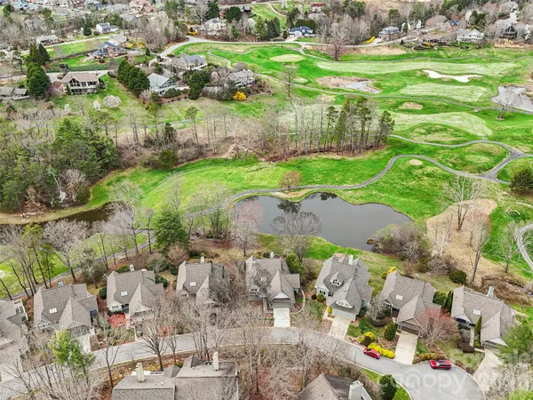 an aerial view of a city with lots of residential buildings