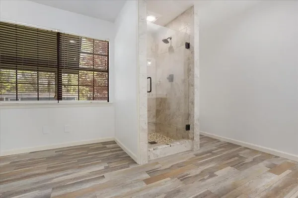 a view of a bathroom with a window