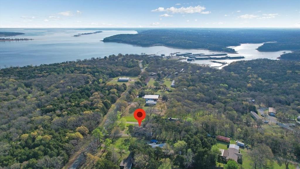 186 Mill Creek Resort Road Pottsboro, TX 75076 - Photo 2 of 36 a view of outdoor space and mountain view