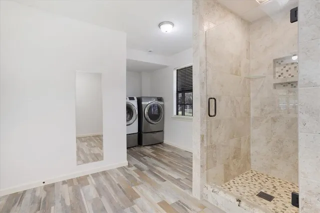 a view of a bathroom with shower
