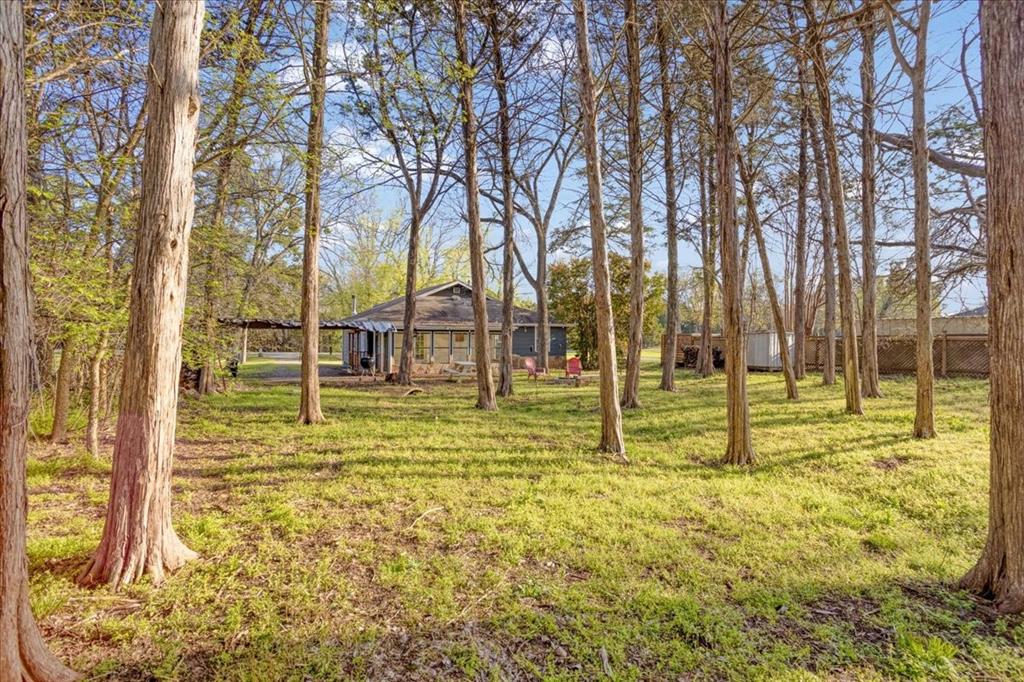 186 Mill Creek Resort Road Pottsboro, TX 75076 - Photo 30 of 35 a view of swimming pool with outdoor seating and yard