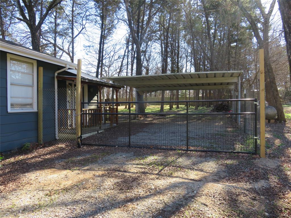 186 Mill Creek Resort Road Pottsboro, TX 75076 - Photo 30 of 36 a view of a backyard