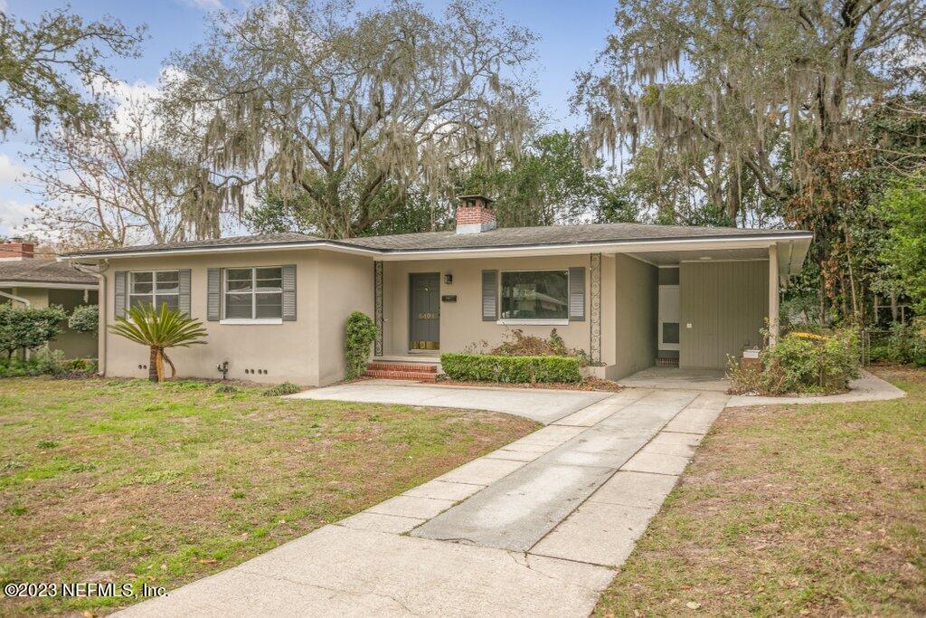 front view of a house with a patio