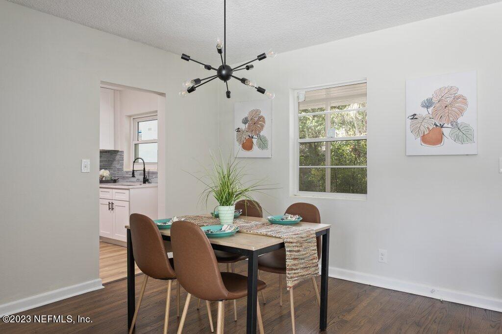 6404 Wesleyan Road Jacksonville, FL 32217 - Photo 16 of 45 a view of a dining room with furniture window and outside view