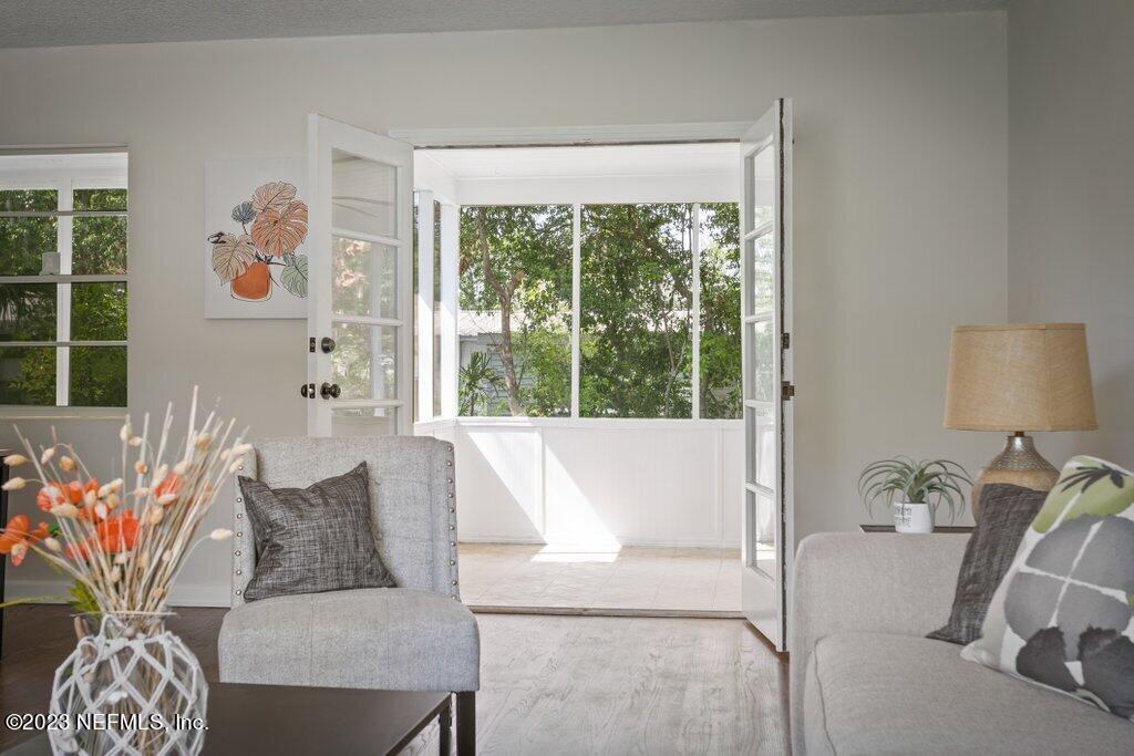 6404 Wesleyan Road Jacksonville, FL 32217 - Photo 17 of 45 a living room with furniture and a large window