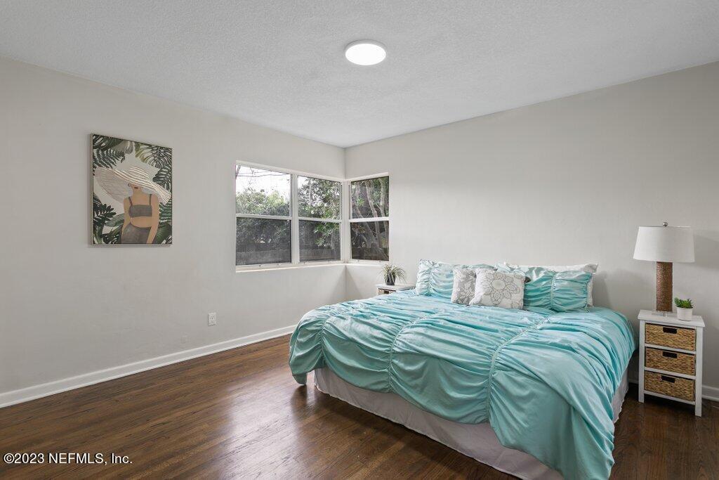 6404 Wesleyan Road Jacksonville, FL 32217 - Photo 18 of 45 a bedroom with a bed and a window