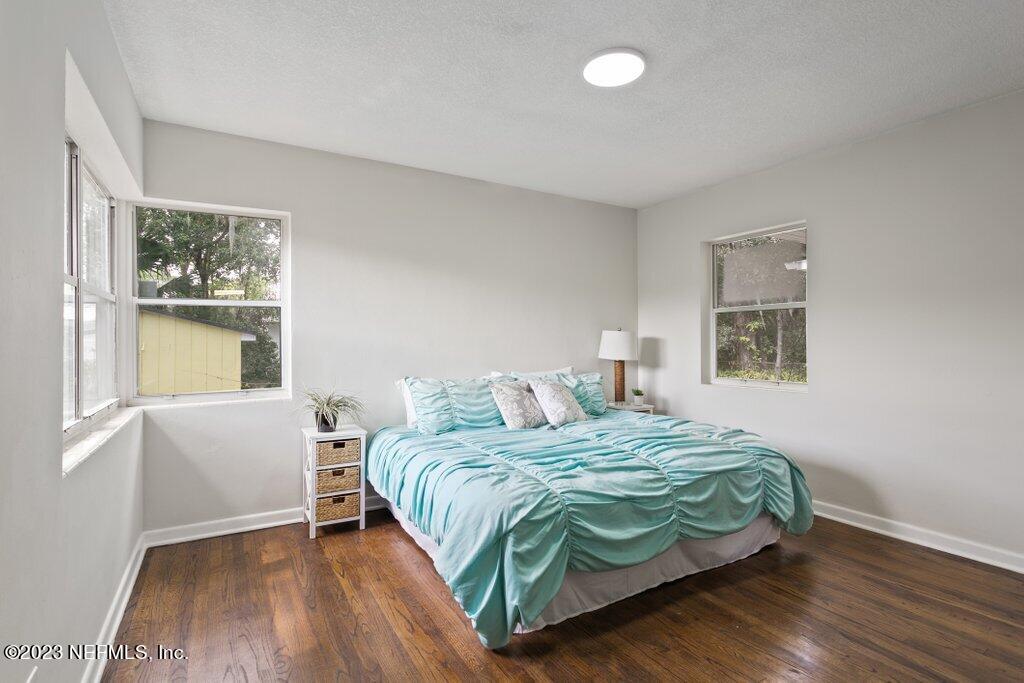 6404 Wesleyan Road Jacksonville, FL 32217 - Photo 19 of 45 a bedroom with a bed and a window