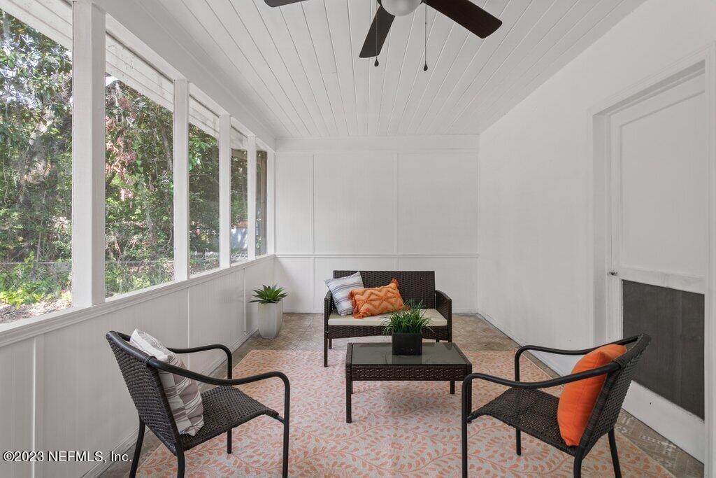6404 Wesleyan Road Jacksonville, FL 32217 - Photo 34 of 45 a living room with furniture and a window