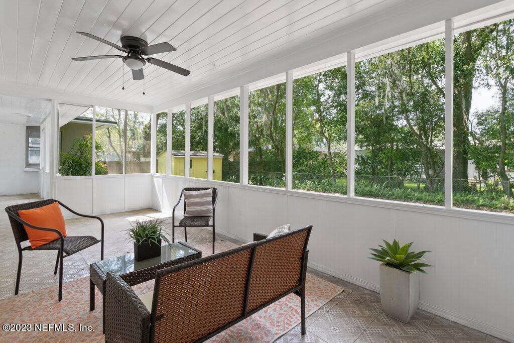 6404 Wesleyan Road Jacksonville, FL 32217 - Photo 35 of 45 a living room with furniture and a large window